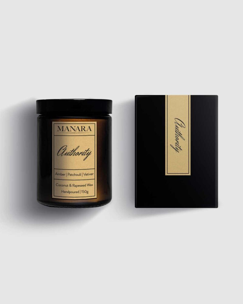 150g Authority Candle placed next to its packaging box by Manara Candles